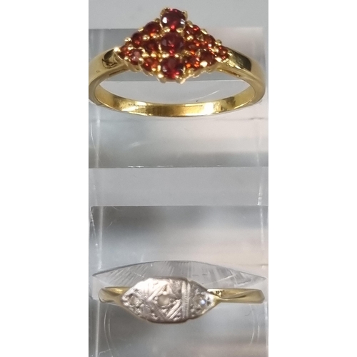 255 - 9ct gold three stone dress ring. 1.9g approx., together with a modern dress ring (B.P. 21% + VAT)