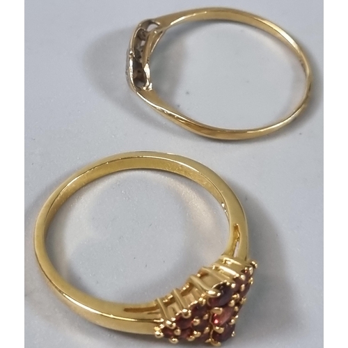 255 - 9ct gold three stone dress ring. 1.9g approx., together with a modern dress ring (B.P. 21% + VAT)