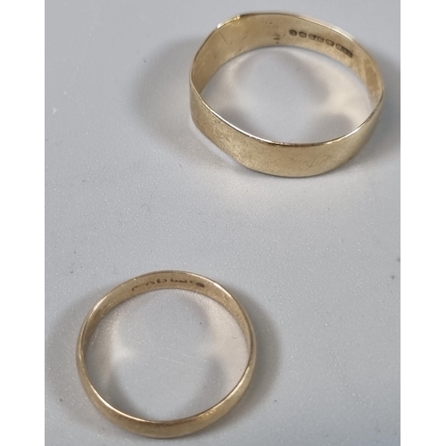 256 - Two 9ct gold wedding bands. 4.3g approx. Ring size M & V 1/2 (B.P. 21% + VAT)