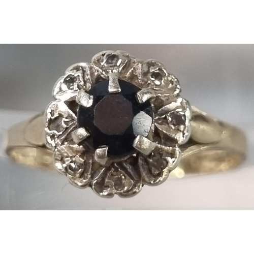 257 - 9ct gold diamond and probably sapphire cluster flowerhead ring. 2.1g approx. Ring size O (B.P. 21% +... 