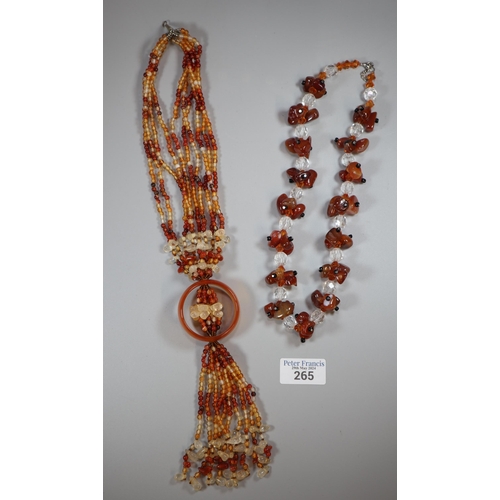 265 - Carnelian and quartz necklace together with other carnelian and crystal jewellery to include necklac... 