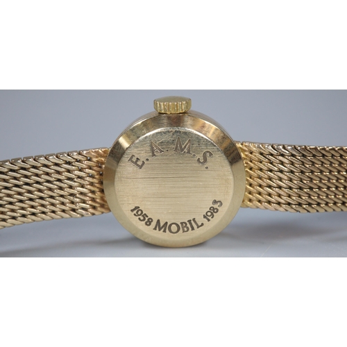 274 - 9ct gold Garrard ladies bracelet watch with satin face, having Baton numerals and integral mesh brac... 