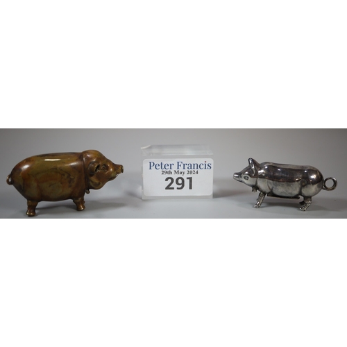 291 - Two novelty vesta cases in the form of pigs, one brass, one white metal.  (2)   (B.P. 21% + VAT)