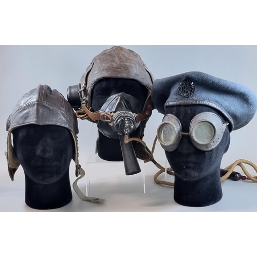 31 - RAF military beret, pair of tinted goggles, leather flying helmet and leather flying helmet with oxy...