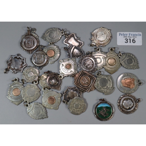 316 - Plastic tub of metal fobs: Irish and Celtic etc.   (B.P. 21% + VAT)