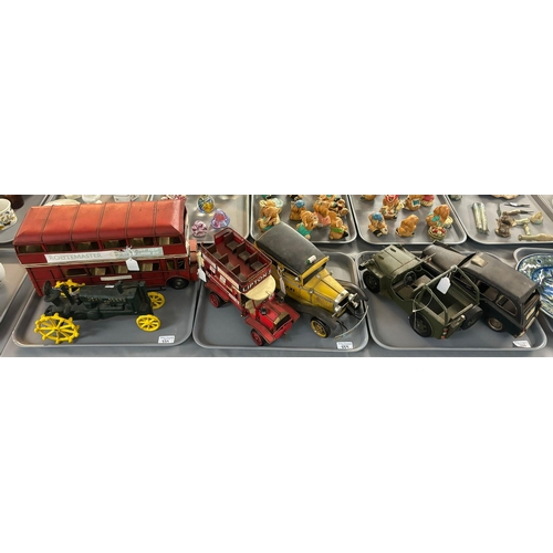 339 - Collection of vintage style metal toys: jeeps, double decker bus, taxi etc. together with a cast iro... 