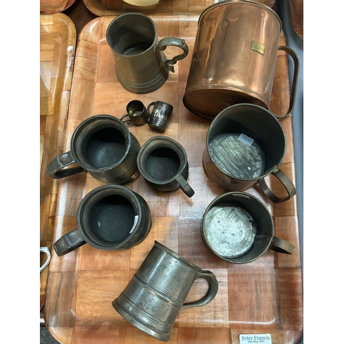 350 - Tray of three graduated copper measures together with some pewter pot bellied tankards etc.   (B.P. ... 