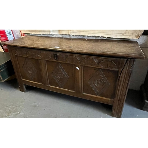 427 - 17th century oak plank chest with lozenge carved panels and moulded hinged top.  108cm wide approx. ... 