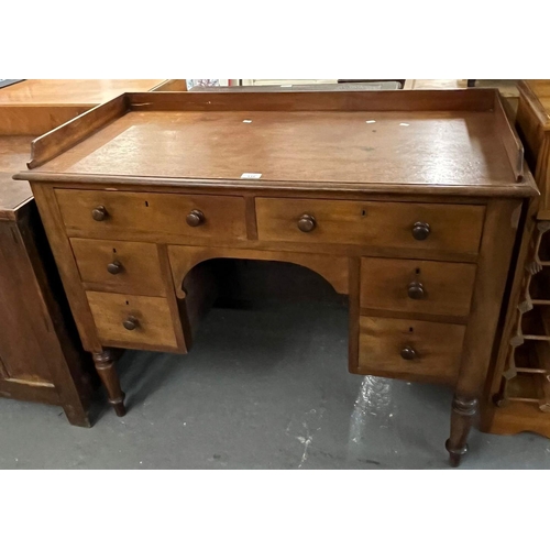 448 - 19th century mahogany kneehole dressing table/desk with solid gallery back and an arrangement of six... 