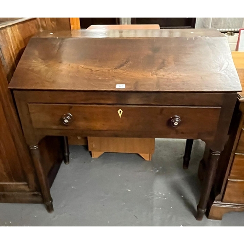 451 - 19th century oak clerk/farm desk with hinged slope front above single frieze drawer with turned knob... 