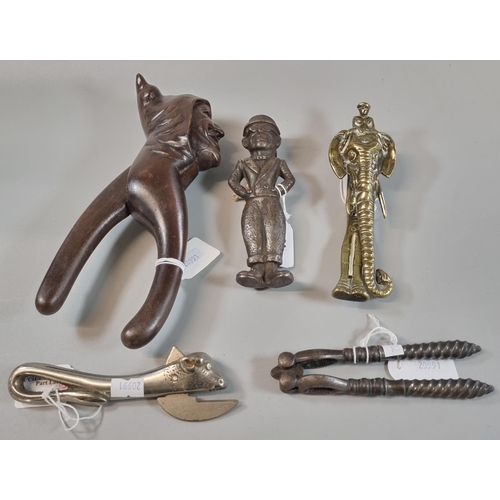 46 - Collection of assorted nut crackers etc. to include: German wooden Monk's head, brass elephant and M... 