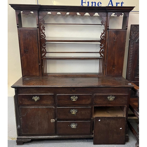 479 - Part 18th century oak two stage dresser, the base probably originally a coffer.  (B.P. 21% + VAT)