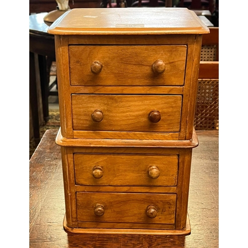 497 - Victorian miniature chest of four drawers with turned legs.  22cm wide approx.  (B.P. 21% + VAT)