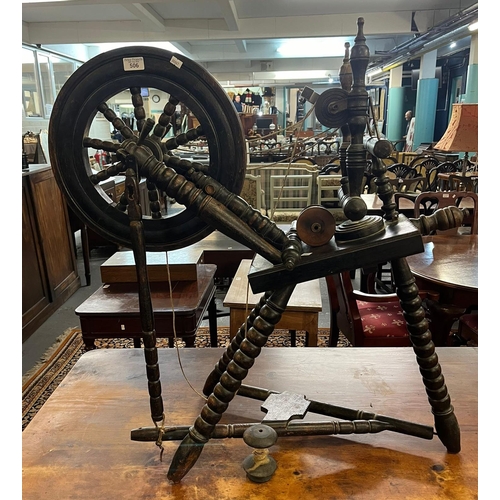 506 - 19th century traditional bobbin turned treadle action spinning wheel.  (B.P. 21% + VAT)