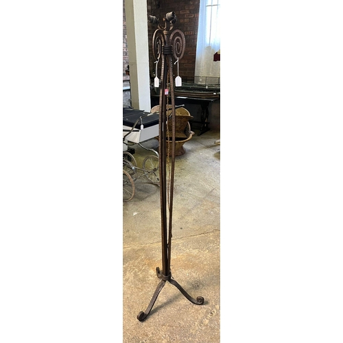 529 - Heavy cast iron tripod lamp base with scroll decoration.  (B.P. 21% + VAT)