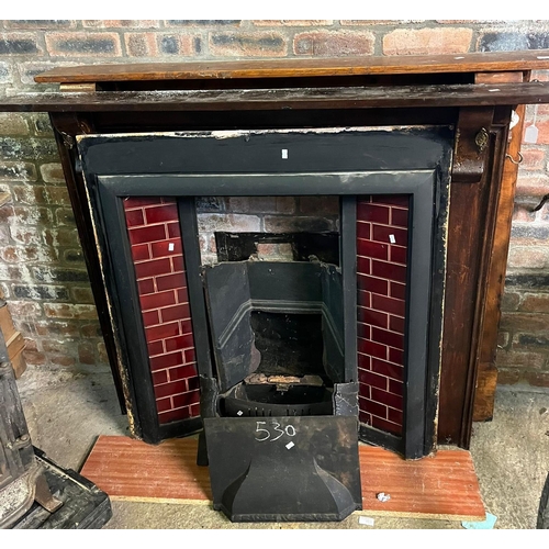 530 - Three Edwardian fire surrounds, one with cast iron tiled inset, grate back etc.  (3)  Provenance: Pe... 