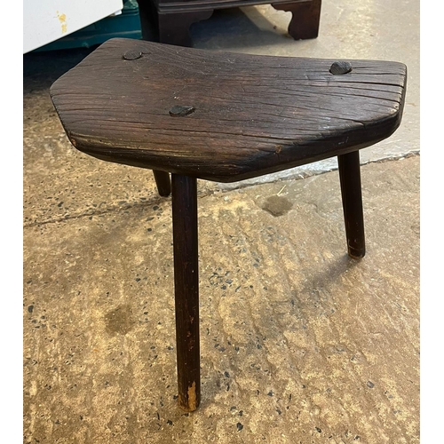 534 - Stained elm and ash three legged milking stool.   (B.P. 21% + VAT)