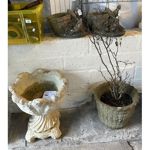 539 - Two reconstituted stoneware planters with bird decoration, a pedestal urn and cylindrical planter.  ... 