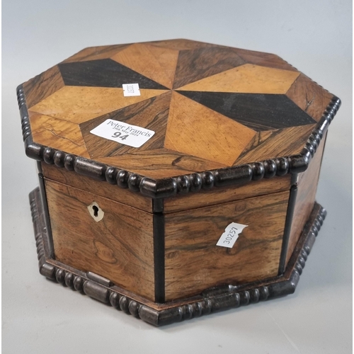 94 - Well made parquetry octagonal shaped box/casket with beaded moldings and interior mirror to the hing... 