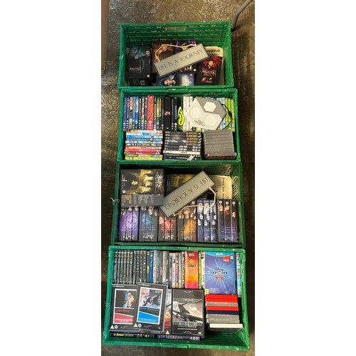 419 - Four green crates of DVDs: Wii Disney Infinity Game and Pad, other Wii games etc.  (4)  (B.P. 21% + ... 