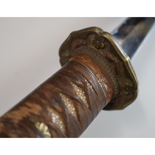 164 - Japanese WWII period officer's sword in standard Schin Gunto fittings with chord bound shark skin gr... 