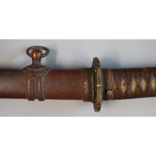 164 - Japanese WWII period officer's sword in standard Schin Gunto fittings with chord bound shark skin gr... 