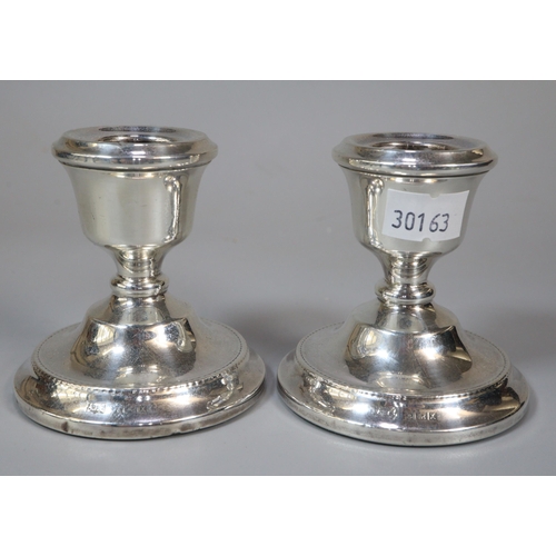 179 - Pair of silver dwarf candlesticks.  Birmingham hallmarks.  (B.P. 21% + VAT)