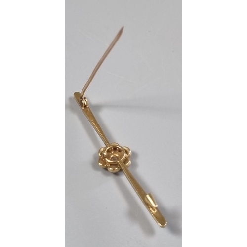 213 - Gold seven stone pearl and diamond bar brooch.  3.6g approx.  (B.P. 21% + VAT)