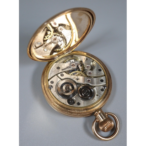 228 - Yellow metal full hunter top wind pocket watch with white enamel Roman face having seconds dial.  En... 