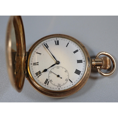 228 - Yellow metal full hunter top wind pocket watch with white enamel Roman face having seconds dial.  En... 