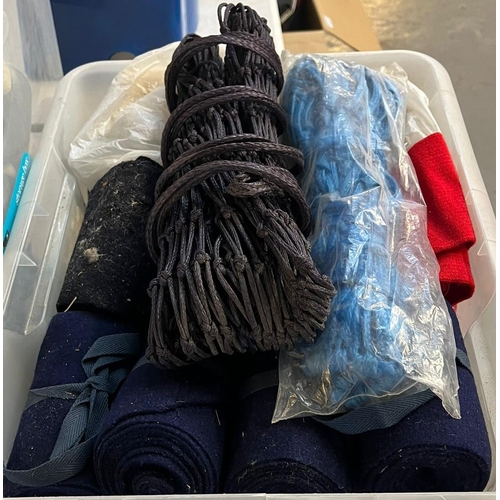 363 - Equestrian - crate of assorted rope halters, leading reins etc. together with a crate of leg bandage... 