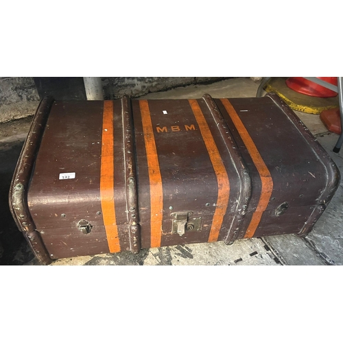 372 - Vintage leather covered travelling trunk together with a cane bound trunk.  (2)  (B.P. 21% + VAT)