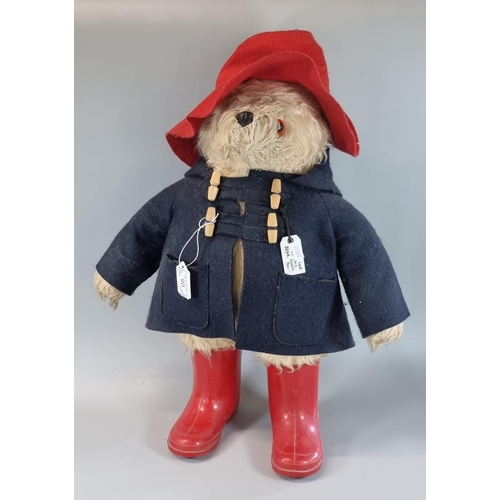 90 - Vintage Paddington Bear soft toy, with red hat, glass eyes, stitched nose, duffle coat and red welli... 