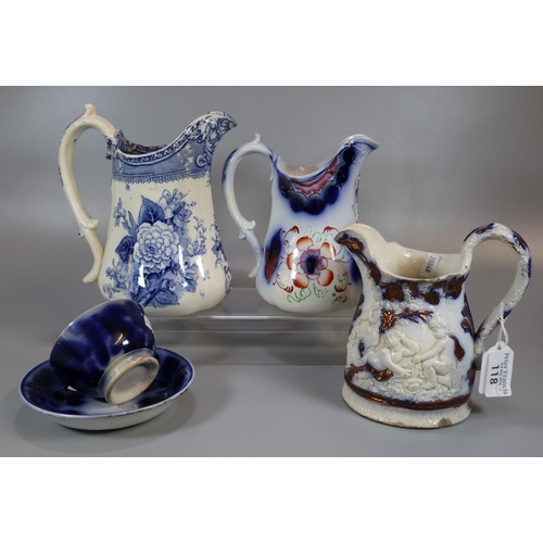 118 - Three 19th century pottery dresser jugs together with a 19th century blue and white tea bowl and sau... 