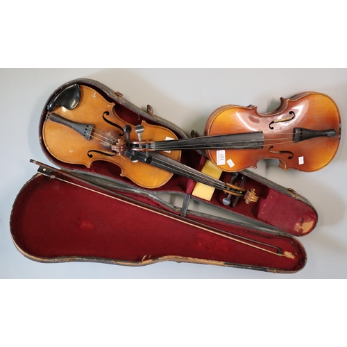 127 - Two student type violins labelled as Stradivarius copies one with bow in fitted case. (2) (B.P. 21% ... 