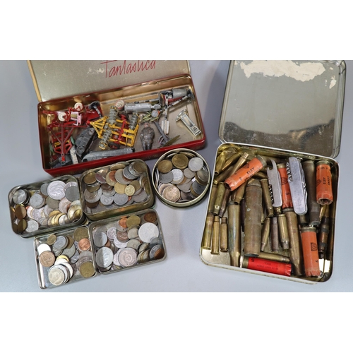 129 - Box containing empty shells: shotgun, military etc.  multi purpose pocket knife, leaded figure, farm... 