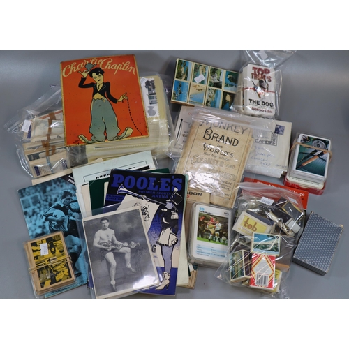 130A - Collection of ephemera to include: tin Charlie Chaplin sign, various playing cards, matchboxes, ciga... 