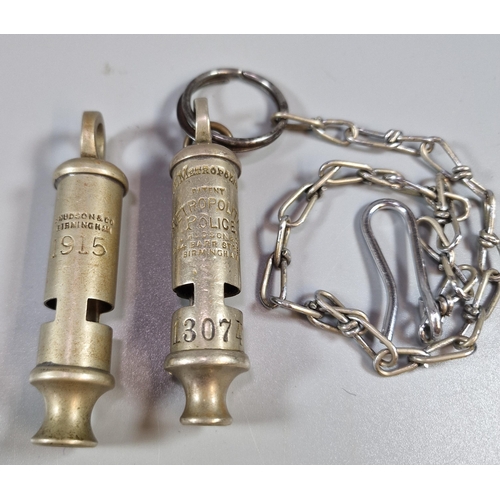 148 - A nickel Hudson and Company of Birmingham police type whistle dated 1915 and a Metropolitan Police t... 