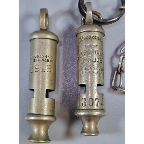 148 - A nickel Hudson and Company of Birmingham police type whistle dated 1915 and a Metropolitan Police t... 