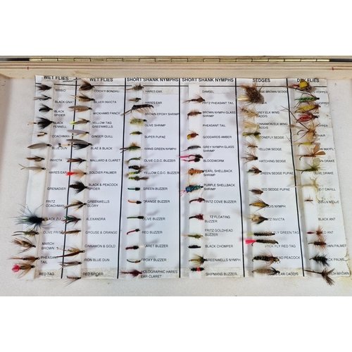 153 - Two wooden cases of various fly fishing flies, some named. (2) (B.P. 21% + VAT)