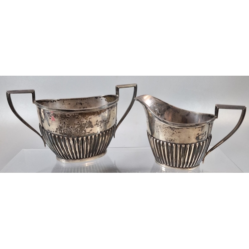 157 - Silver, fluted, two handled sucriere by Walker & Hall Sheffield, with similar milk jug. 12.3 troy oz... 