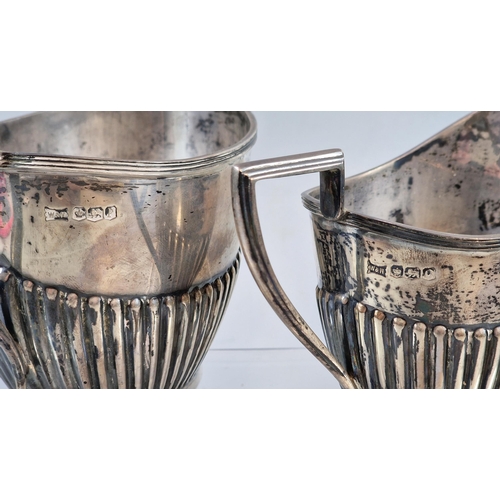 157 - Silver, fluted, two handled sucriere by Walker & Hall Sheffield, with similar milk jug. 12.3 troy oz... 