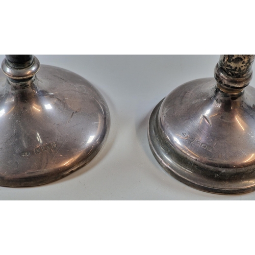 158 - Two similar silver trumpet vases with loaded bases. The tallest 19cm approx. Birmingham hallmarks. (... 