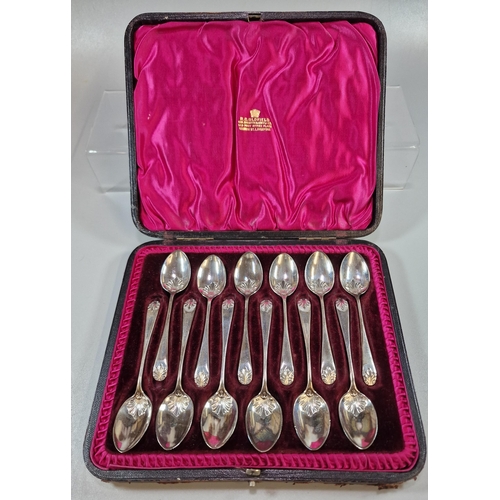 164 - Set of twelve silver teaspoons in fitted case.  Sheffield hallmarks.  4.7 troy oz approx.  (B.P. 21%... 