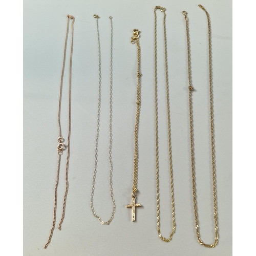 178 - Collection of 9ct gold fine link chains, one with a crucifix pendant. 6.6g approx. (B.P. 21% + VAT)