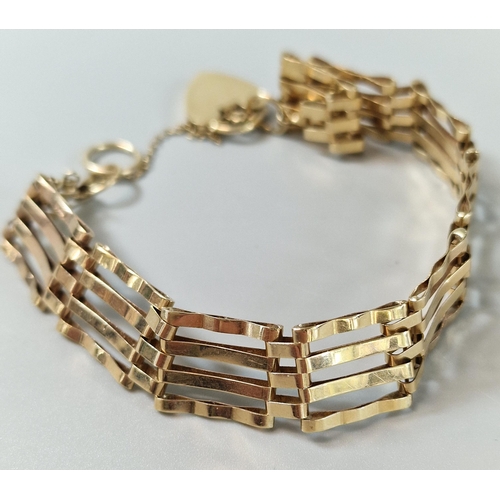 182 - 9ct gold 4 bar gate bracelet with heart shaped padlock. 9.2g approx. (B.P. 21% + VAT)