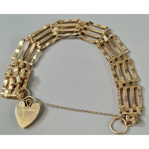 182 - 9ct gold 4 bar gate bracelet with heart shaped padlock. 9.2g approx. (B.P. 21% + VAT)