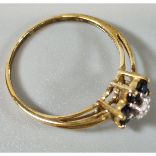 195 - 9ct gold diamond and sapphire flowerhead cluster ring. 1.3g approx. size M1/2 (B.P. 21% + VAT)