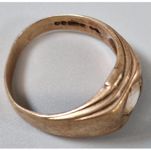 208 - 9ct gold signet type ring inset with a clear paste stone. 9.3g approx. Size V.  (B.P. 21% + VAT)