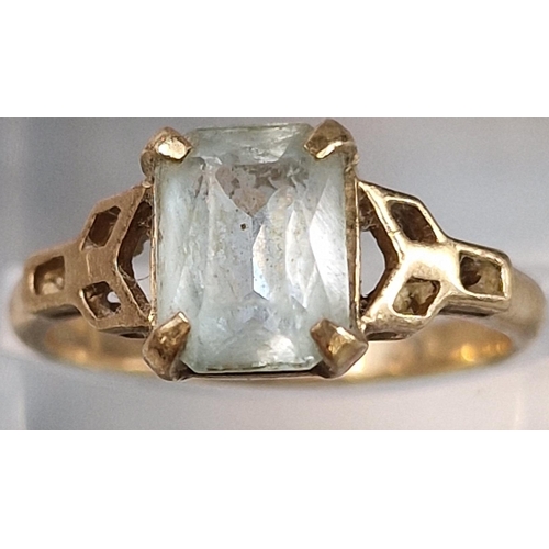 209 - 9ct gold and blue topaz ring. 2.7g approx. Size L.  (B.P. 21% + VAT)